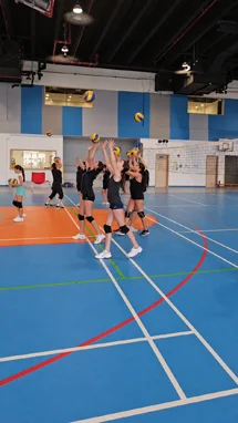 Training at a summer volleyball camp