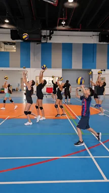 Training at a summer volleyball camp